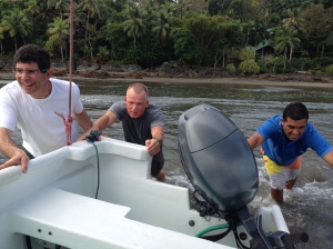 Pushing the boat in Drake Bay